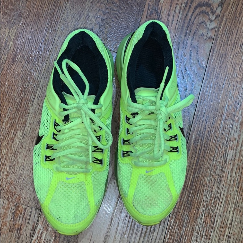 Neon yellow Nike AirMax running shoes